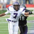 Scotty Thurman, Fayetteville senior receiver, reaches for a pass as Bentonville junior defensive bac...