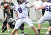 Fayetteville junior quarterback Austin Allen passes through the Bentonville defense Dec. 3 during the Class 7A state championship game in War Memorial Stadium in Little Rock.
