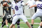 Fayetteville junior quarterback Austin Allen passes through the Bentonville defense Dec. 3 during the Class 7A state championship game in War Memorial Stadium in Little Rock.