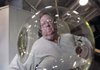 Dave Robenolt works on a glass bowl at the Steuben Glass factory inside the Corning Museum of Glass in Corning, N.Y., in this file photo.