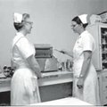 Licensed practical nurse Hulda Flynn, right, demonstrates the handling of sterile instruments to stu...