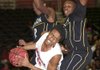 Maumelle’s Derrick Person (11) tries to move underneath while Pulaski Robinson’s Barndon Burks (left) and Antonio Lay defend during the Hornets 74-29 victory over the Senators.