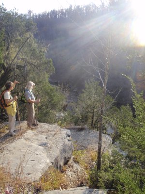 Karen and Tom Mowry of Nob Hill enjoy the view at sunset from a promontory on the North Sylamore Creek Trail. The route takes hikers up and down along North Sylamore Creek, sometimes beside its clear water and sometimes high above it.