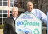Tim Broughton, vice president of McKee Foods’ Gentry operation, left, and Jim Twiggs, the company’s local green team leader, were pivotal in making the facility reach zero landfill status. The maker of Little Debbie and Sunbelt snacks is recycling all but 3 percent of waste created on site. The final 3 percent is sent to a company that turns waste to energy.
