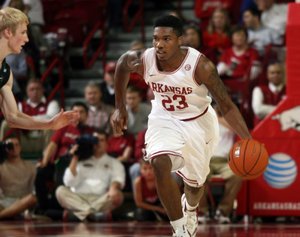 Arkansas Democrat-Gazette/RYAN MCGEENEY --11-11-11--
Razorbacks guard Julysses Nobles sprints upcourt during the first half of Friday night's game against the USC Upstate Spartans at Bud Walton Arena in Fayetteville.