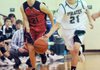 Arkansas Democrat-Gazette/MICHAEL WOODS --12/16/2011-- Greenland's Mason White takes the ball up court as Mansfield defender Ben Fisher tries to put on the pressure during Friday nights game in Greenland.