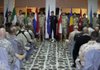 NATO Training officers stand during a ceremony marking the official closure of NATO training mission in Baghdad, Iraq, Saturday, Dec. 17, 2011. 