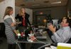 Arkansas Democrat-Gazette/RYAN MCGEENEY --12-15-11--  Kate Berg, center, president of Collective Bias, a social marketing company, chats with co-founder Amy Callahan, left, and CEO John Andrews Thursday afternoon at the company's Bentonville office.
