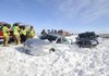 Emergency responders assist victims of a multiple-vehicle accident Tuesday on westbound Interstate 40 about 15 miles west of Amarillo, Texas. 