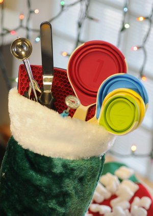 Items such as an instant read thermometer, silicone collapsible measuring cups, a cookie scoop and an offset spatula can be great stocking stuffers for cooks at Christmas.