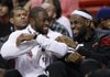 Dwyane Wade (left), LeBron James and the Miami Heat were two games away from an NBA championship last season. After a five-month lockout, they’ll have a 66-game regular season starting Sunday in which to pursue another one. 