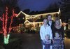 A festive display of Christmas lights was a team effort for the Maestri family at 1501 W. Pine St. in Rogers. Debi Maestri, right, her daughter Dani Madison, left, and Dani’s husband Diereck Madison, put up the lights with help from the Madison children Drake Madison, left, and Drew Madison.
