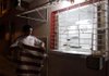 Julio Cesar Hidalgo prepares to close Baldoquin’s Cafeteria, which he recently opened and runs from his home in Havana, for the night. 