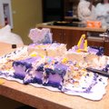 A birthday cake sits partially finished Friday, Dec. 9, 2011 in Peace at Home Family Shelter's kitch...