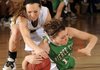 Brooke Mabeus of Bentonville, left, fights for a loose ball Wednesday with Pierce City’s Kaelyn Osborn during the Lady Tigers’ game against the Lady Eagles in the Neosho Holiday Classic in Neosho, Mo.
