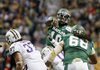 Baylor quarterback Robert Griffin III, rear, throws a pass during the first half of the Alamo Bowl college football game against Washington, Thursday, Dec. 29, 2011, at the Alamodome in San Antonio. (AP Photo/Darren Abate)