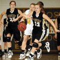 Taylor Lee of Bentonville, right, chases down a loose ball Thursday.