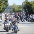 Motorists on two — and sometimes three — wheels fill Dickson Street during the 2011 Bikes, Blues & B...
