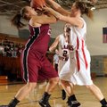 Daylee Gilyard, Springdale High, left, fights for a rebound under the basket Thursday with McDonald ...