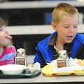STAFF PHOTO ANDY SHUPE
Cadi Cox, left, sticks her tongue out at fellow pre-kindergarten student Mic...