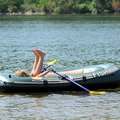 STAFF PHOTO DAVID FRANK DEMPSEY
Mia Bassler, 6, works on her rowing technique on Beaver Lake at Mon...