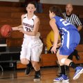 Sierra Dickard, Springdale High, left, drives the ball Friday under pressure from Carthage’s Leigh A...