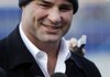 Former Philadelphia Flyers player Eric Lindros speaks at a news conference at Citizens Bank Park where preparations are underway for NHL hockey's Winter Classic, Friday, Dec. 30, 2011, in Philadelphia. For the first time in years, Lindros returns wearing a Flyers sweater, leading them in the Winter Classic alumni game scheduled for Saturday. The New York Rangers and the Philadelphia Flyers are scheduled to play on Jan. 2. 