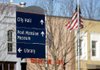 
One of the many signs installed in Bentonville is seen on E. Central Avenue on the downtown square on Saturday, Dec. 31, 2011.