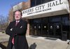 Rogers Mayor Greg Hines stands outside Rogers City Hall on Wednesday as he nears the end of his first year in office.
