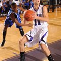 Kile Graves, Fayetteville senior, right, scores past Oklahoma City Southeast’s Roemello Roberson dur...