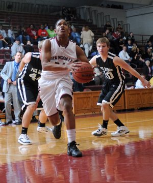 Springdale High School hosted Pea Ridge High School on Nov. 17 at Bulldog Gym in Springdale. The Bulldogs beat the Blackhawks 69-36.