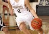 Collin Roberts, Bentonville junior guard, drives the ball Dec. 21 against Pea Ridge at Tiger Arena in Bentonville.