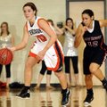 Gira Britton, Rogers Heritage, left, drives the ball Dec. 16 as Pea Ridge’s Savannah Cypert gives ch...