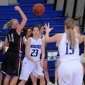 Lindsey Larkin of Siloam Springs, left, watches the ball as McKinzie James of Rogers High School, ce...