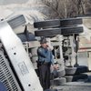 Driver Injured In Gravel Truck Mishap