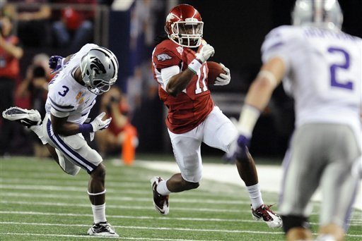 arkansas-cobi-hamilton-11-runs-against-kansas-states-allen-chapman-3-as-tysyn-hartman-2-defends-during-the-first-half-of-the-cotton-bowl-in-arlington-texas