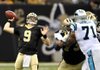 New Orleans Saints quarterback Drew Brees (9) passes as Carolina Panthers defensive tackle Jason Shirley (71) rushes during the second quarter of an NFL football game in New Orleans, Sunday, Jan. 1, 2012. (AP Photo/Bill Feig)