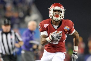 University of Arkansas kick returner Joe Adams breaks away for a runt return touchdown in the second quarter of Friday nights game at the 2012 Cotton bowl at Cowboy Stadium in Arlington