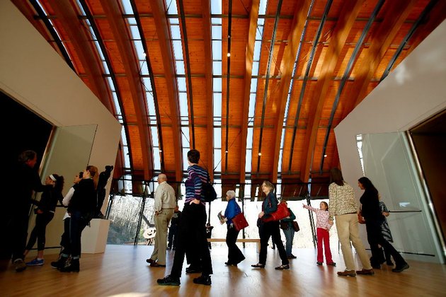 arkansas-democrat-gazettejason-ivester-010512-a-tour-group-passes-between-galleries-inside-crystal-bridges-museum-of-american-art-in-bentonville-on-thursday-jan-5-2012-during-the-greatest-hits-tour