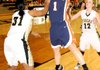 Julie Whitlow, Lady War Eagles guard, shoots for two points while guarded by the Lady Tigers’ Rashaun Casey, left, and Taylor Lee, right, at Tiger Arena in Bentonville on Friday.