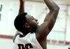 D.J. Evans, Springdale High sophomore, shoots against Rogers on Friday in the first half at Bulldog Gym in Springdale.
