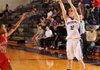 Hailey Young, a Fayetteville senior guard, shoots a 3-pointer in front of Fort Smith Northside junior guard Bria Caldwell. Fayetteville will travel to Rogers Heritage tonight for a 7A-West Conference clash.
