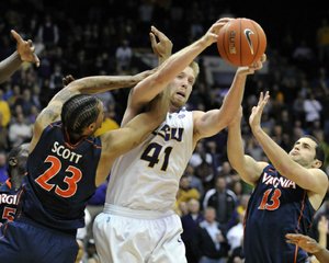 LSU center Justin Hamilton (center), who transferred from Iowa State and leads the team in scoring, has been the focal point for the Tigers this season.