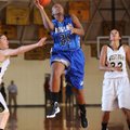 Taylor Strickland, Rogers junior forward, takes a shot in the lane past the West Fork defense Nov. 2...