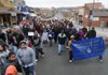 A crowd of around 300 people march west up Dickson St. Monday Jan. 17, 2011 in honor of Martin Luther King Jr. Day. The march began at the Walton Arts Center parking lot and went to the Arkansas Union at the University of Arkansas.
