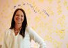 Emily Rappe is the new director of development for the Children’s Advocacy Center in Little Flock. The office has a wall filled with stars with the names of all the children who have been through the CAC program.
