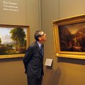 Louvre Museum Director Henri Loyrette looks at oil paintings of English born American artist Thomas ...