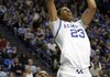 Kentucky's Anthony Davis, right, dunks during the second half of an NCAA college basketball game in Lexington, Ky., Tuesday, Jan. 17, 2012. Kentucky won 86-63. (AP Photo/James Crisp)