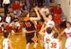 Terence Pierce of Gravette dribbled into the lane to get off a high-percentage shot over four Farmington defenders. The Gravette senior boys basketball team won a conference game, 62-45, at Farmington on Jan. 10.