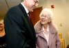 Chancellor Dan Rahn of the University of Arkansas for Medical Sciences speaks to Pat Walker of Springdale following a news conference Tuesday announcing a $1.5 million gift to the UAMS Northwest Campus in Fayetteville from the Willard and Pat Walker Charitable Foundation.